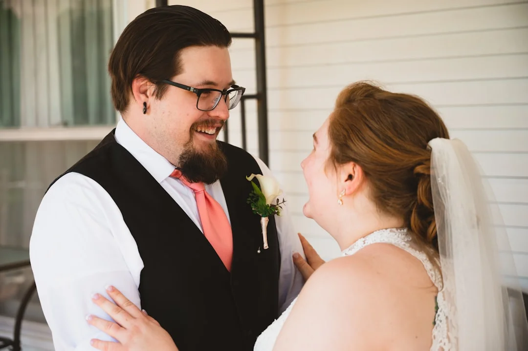 a man and a woman standing next to each other